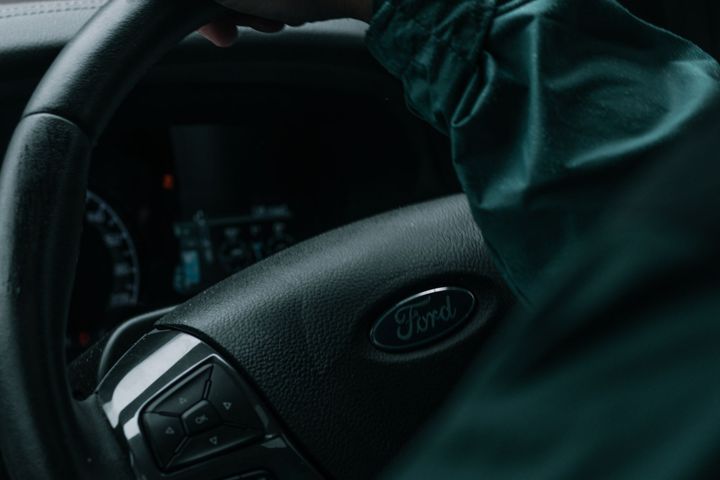 Learner driver's hands on the steering wheel
