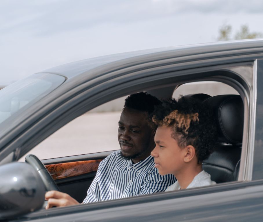 Driving instructor with a learner in the car